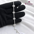 Station bracelet in 925 silver with pavé moissanite clovers along the chain
