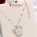 Bear-motif pendant in 925 silver with a round moissanite centre on a beaded chain