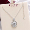Round halo solitaire pendant in 925 silver with a large moissanite centre