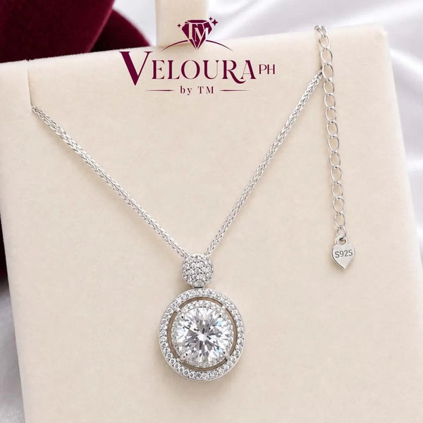 Round halo solitaire pendant in 925 silver with a large moissanite centre