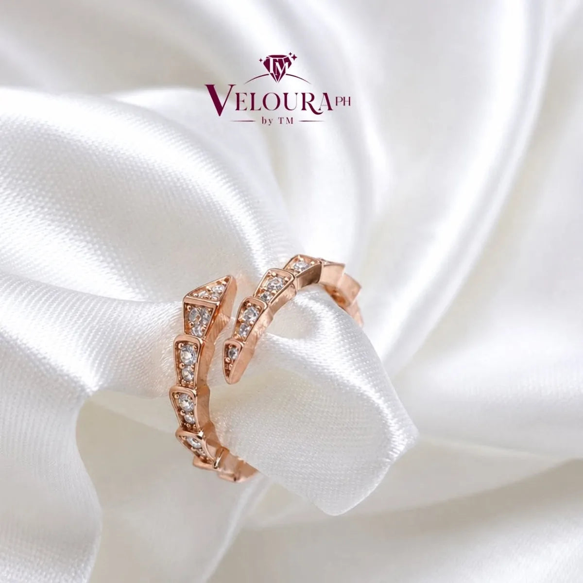 Rose-gold plated vine eternity ring in 925 silver set all round with moissanite
