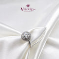 Petite round halo ring in 925 silver with a moissanite centre